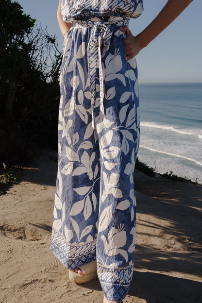 Arlene Sleeveless Waist Tie Tropical Print Wide Leg Jumpsuit Blue